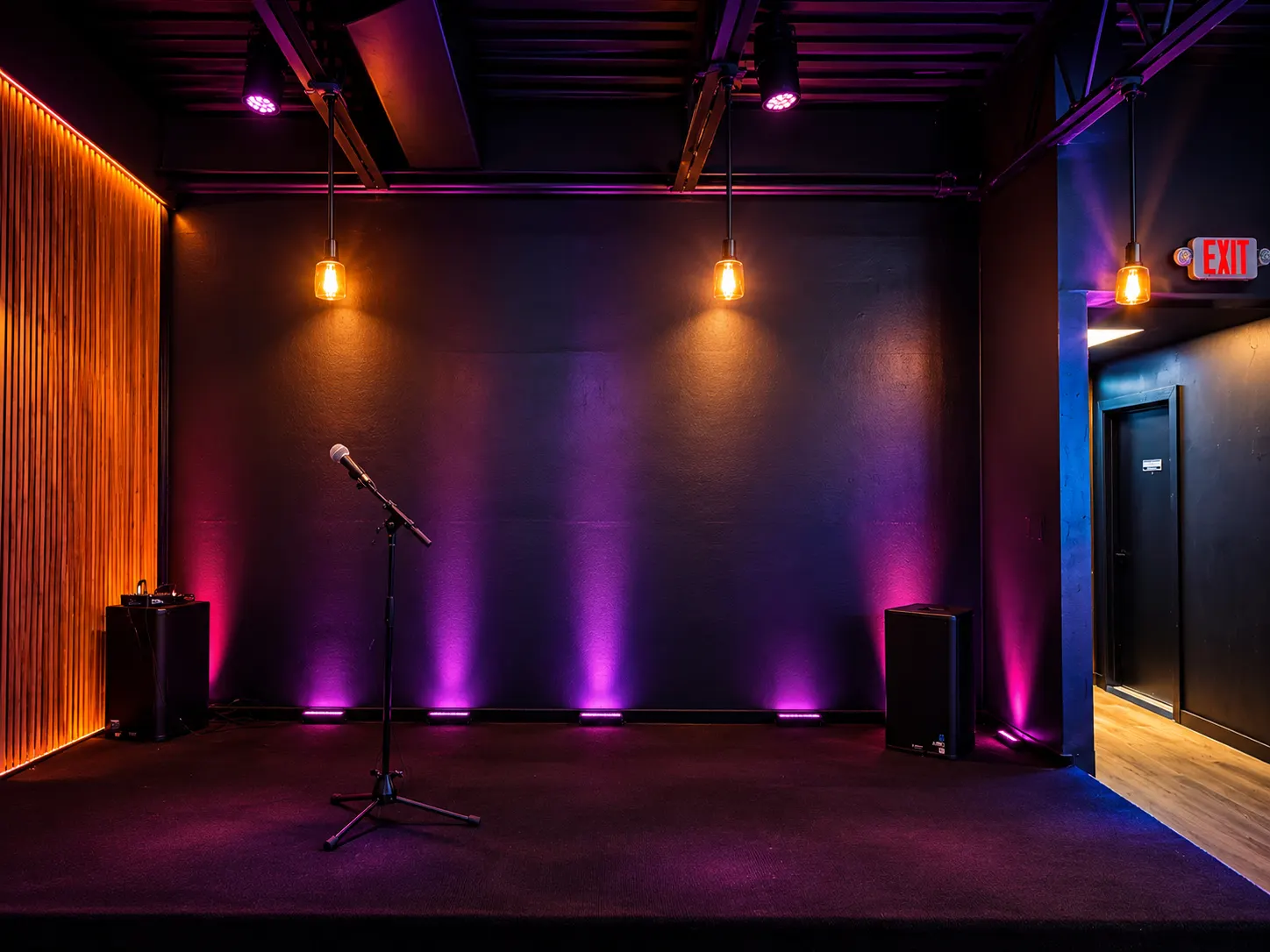 The stage at The Khukuri Restaurant Bar & Grill, a microphone under purple lights